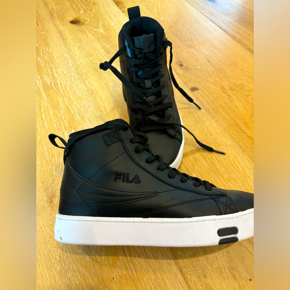 Like new Fila high tops.